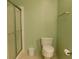 Clean bathroom with shower, toilet, and vanity at 11064 Ne 212Th Ln, Fort Mc Coy, FL 32134