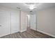 Bedroom with double door closet and wood-look floors at 13457 Sw 107Th Pl, Dunnellon, FL 34432