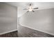 Spacious living room with vinyl plank flooring and ceiling fan at 13457 Sw 107Th Pl, Dunnellon, FL 34432