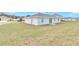 Large backyard with a new home at 2809 Ne 43Rd Rd, Ocala, FL 34470
