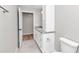 Clean bathroom with white vanity, granite countertop and access to another room at 2809 Ne 43Rd Rd, Ocala, FL 34470
