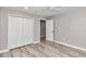 Spacious bedroom with double door closet and access to a bathroom at 2809 Ne 43Rd Rd, Ocala, FL 34470