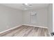 Spacious bedroom with ceiling fan, vinyl flooring and window coverings at 2809 Ne 43Rd Rd, Ocala, FL 34470