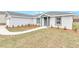 Single story house with gray roof and landscaping at 2809 Ne 43Rd Rd, Ocala, FL 34470