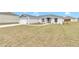 Newly built home with a garage and yard at 2809 Ne 43Rd Rd, Ocala, FL 34470
