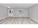 Bright and airy living room with a view of the front door and window at 2809 Ne 43Rd Rd, Ocala, FL 34470