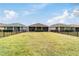 Aerial view of homes with fenced backyards and lawns at 3977 Nw 46Th Ter, Ocala, FL 34482