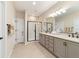 Double vanity bathroom with a large walk in shower at 3977 Nw 46Th Ter, Ocala, FL 34482