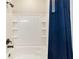 Bathroom with shower/tub and blue shower curtain at 3977 Nw 46Th Ter, Ocala, FL 34482