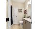 Bathroom with toilet, vanity, and linen closet at 3977 Nw 46Th Ter, Ocala, FL 34482
