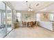Kitchen breakfast nook with view of living room and backyard at 3977 Nw 46Th Ter, Ocala, FL 34482