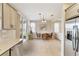 View of breakfast nook, kitchen, and stainless steel refrigerator at 3977 Nw 46Th Ter, Ocala, FL 34482