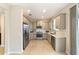 Well-equipped kitchen with stainless steel appliances and ample counter space at 3977 Nw 46Th Ter, Ocala, FL 34482