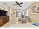 Open living room with comfortable seating and views to the kitchen at 3977 Nw 46Th Ter, Ocala, FL 34482