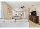 Open living room showcasing comfortable seating and a view into another room at 3977 Nw 46Th Ter, Ocala, FL 34482