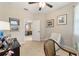 Cozy home office with a comfortable chair and access to another room at 3977 Nw 46Th Ter, Ocala, FL 34482