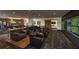 Relaxing lounge with large screen TVs and seating at 4072 Nw 44Th Cir, Ocala, FL 34482