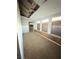 Unfinished hallway with access to rooms at 421 Sw 3Rd St, Ocala, FL 34471