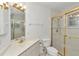 Bathroom with shower and gold-toned fixtures at 5370 Sw 85Th Ln, Ocala, FL 34476