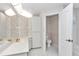 Main bathroom with toilet, sink and shower/tub combo at 5370 Sw 85Th Ln, Ocala, FL 34476