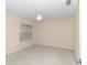 Spacious bedroom with ceiling fan and neutral walls at 5370 Sw 85Th Ln, Ocala, FL 34476