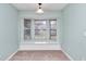 Charming breakfast nook with built-in window seat and window coverings at 5370 Sw 85Th Ln, Ocala, FL 34476