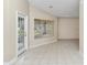 Dining room with tile floors, French door to patio, and window at 5370 Sw 85Th Ln, Ocala, FL 34476
