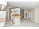 Bright kitchen with an island and white cabinetry at 5370 Sw 85Th Ln, Ocala, FL 34476