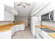 Kitchen with white appliances and an eat-in area at 5370 Sw 85Th Ln, Ocala, FL 34476