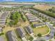 Aerial view of houses and landscape in a residential community at 7732 Sw 94Th Cir, Ocala, FL 34481