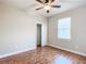 Bedroom with wood flooring, ceiling fan and closet at 7732 Sw 94Th Cir, Ocala, FL 34481