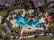 Aerial view of resort-style pool with surrounding lounge areas at 7732 Sw 94Th Cir, Ocala, FL 34481