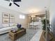 Bright living room with comfy sofa and dining area at 7732 Sw 94Th Cir, Ocala, FL 34481