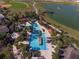 Resort-style pool area with multiple pools and lounge areas at 7732 Sw 94Th Cir, Ocala, FL 34481