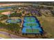 Aerial view of multiple community tennis courts at 7732 Sw 94Th Cir, Ocala, FL 34481