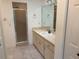 Bathroom with vanity, sink, and shower at 9117 Sw 93Rd Cir, Ocala, FL 34481