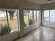 Bright sunroom with multiple windows and tile floor at 9117 Sw 93Rd Cir, Ocala, FL 34481