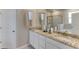 Double vanity bathroom with granite countertop and large shower at 9287 Sw 60Th Court Rd, Ocala, FL 34476