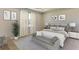 Spacious bedroom with a queen bed and plenty of natural light at 9287 Sw 60Th Court Rd, Ocala, FL 34476