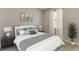 Spacious bedroom with a king-size bed and neutral decor at 9287 Sw 60Th Court Rd, Ocala, FL 34476
