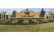 Attractive community entrance with landscaping and signage at 9287 Sw 60Th Court Rd, Ocala, FL 34476