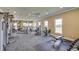 Fitness center with various equipment and large windows at 9287 Sw 60Th Court Rd, Ocala, FL 34476