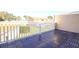 Private balcony overlooking water and community at 11001 Se Sunset Harbor Rd # F45, Summerfield, FL 34491