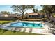 Refreshing community pool with surrounding lounge area at 11001 Se Sunset Harbor Rd # F45, Summerfield, FL 34491