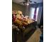 Bedroom with a large bed and stuffed animals at 11434 Sw 131St Ter, Dunnellon, FL 34432