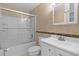 Clean bathroom with a shower/tub combo, vanity, and medicine cabinet at 11852 Se 71St Ct, Belleview, FL 34420
