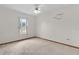 Bright bedroom with carpet flooring and ceiling fan at 11852 Se 71St Ct, Belleview, FL 34420