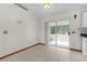 Bright dining area with access to the backyard at 11852 Se 71St Ct, Belleview, FL 34420
