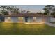 Charming one-story house with a well-maintained lawn at 11852 Se 71St Ct, Belleview, FL 34420