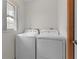 Bright laundry room, complete with washer and dryer at 11852 Se 71St Ct, Belleview, FL 34420